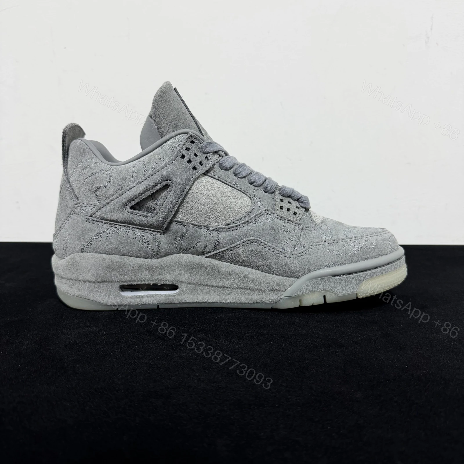 View 2 of Air Jordan 4 Retro KAWS Grey Reps