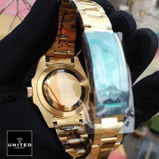 View 8 of Rolex GMT-Master II 11678LN Yellow Gold Green Dial oyster Replica