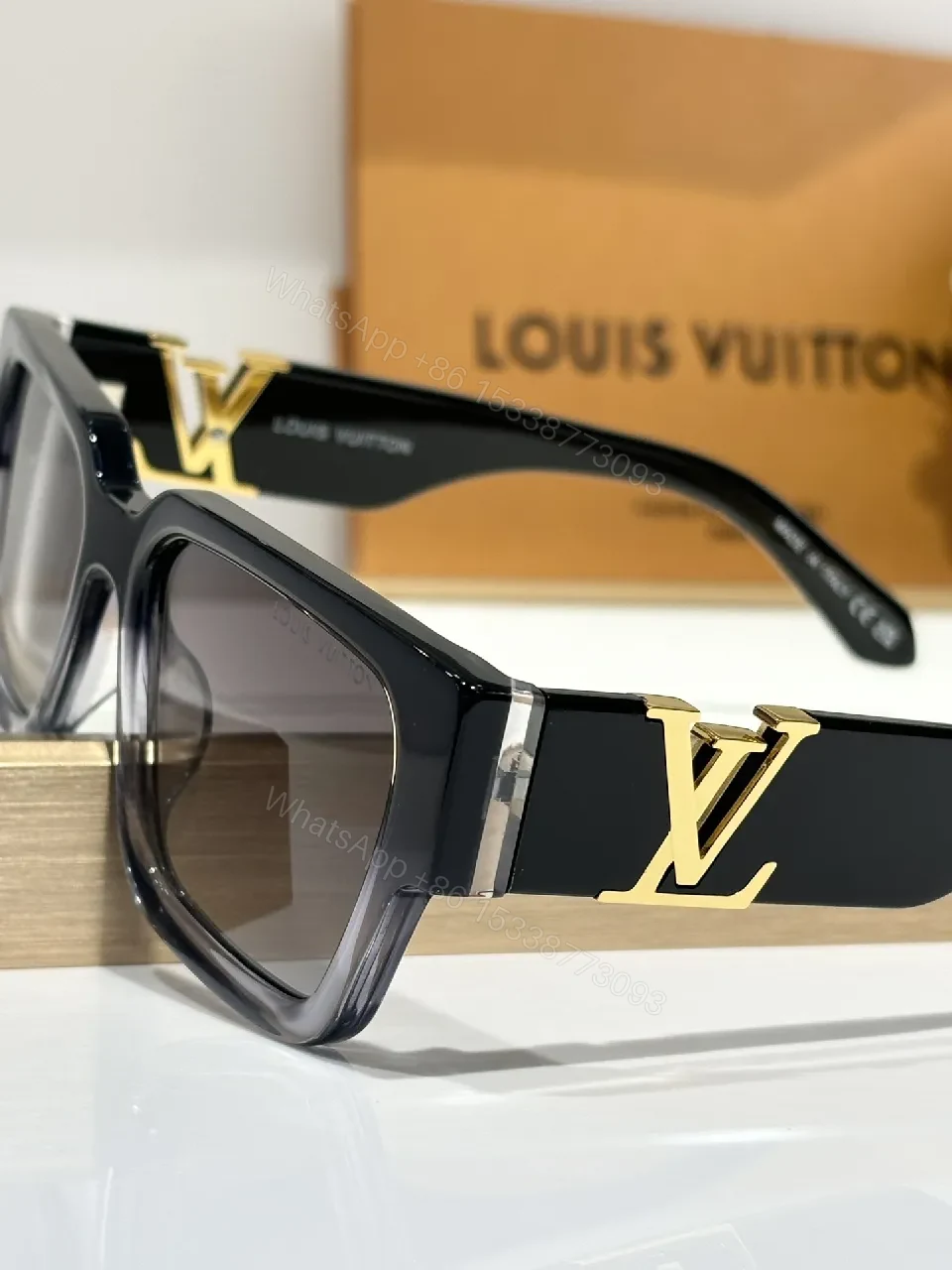 View 7 of Bold Black Sunglasses with Gold Emblem – Modern, Durable Acetate Frames