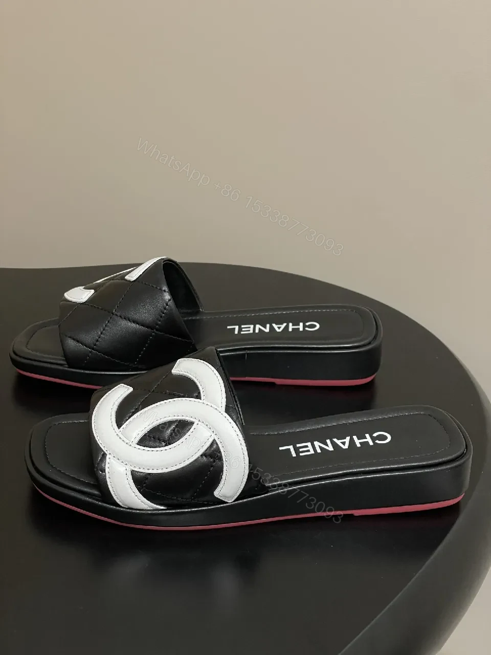 View 2 of Quilted Black Slides with Bold Logo Straps - Luxury Casual