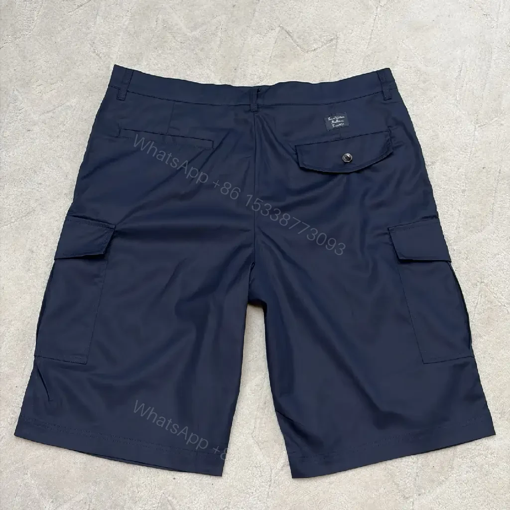 View 7 of Navy Cargo Shorts with Louis Vuitton Logo Embossed Key Features Short