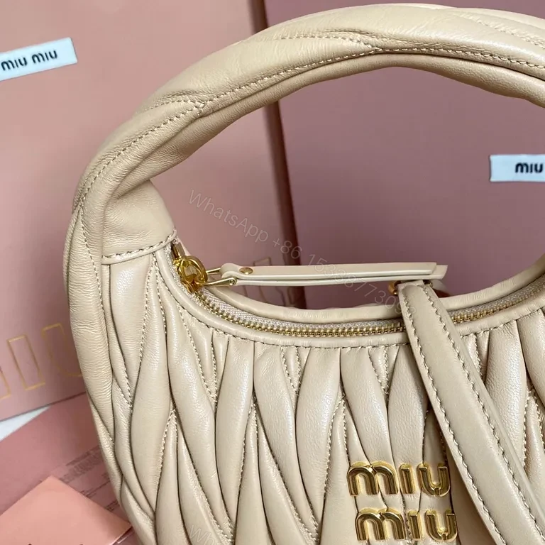 View 8 of Chic Quilted Leather Bag: Compact Luxury, Blush, Miu Miu Style