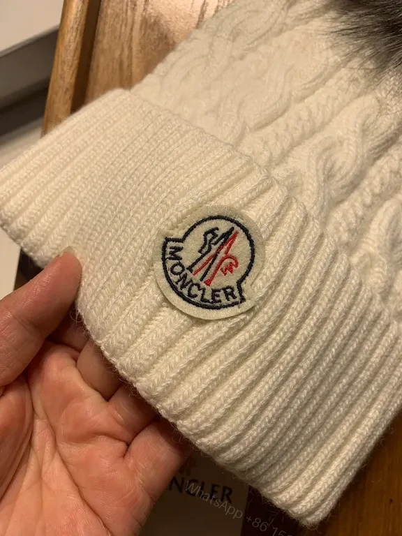 View 4 of Cozy Cable Knit Beanie with Fur Pom â€” Moncler Luxury Warmth