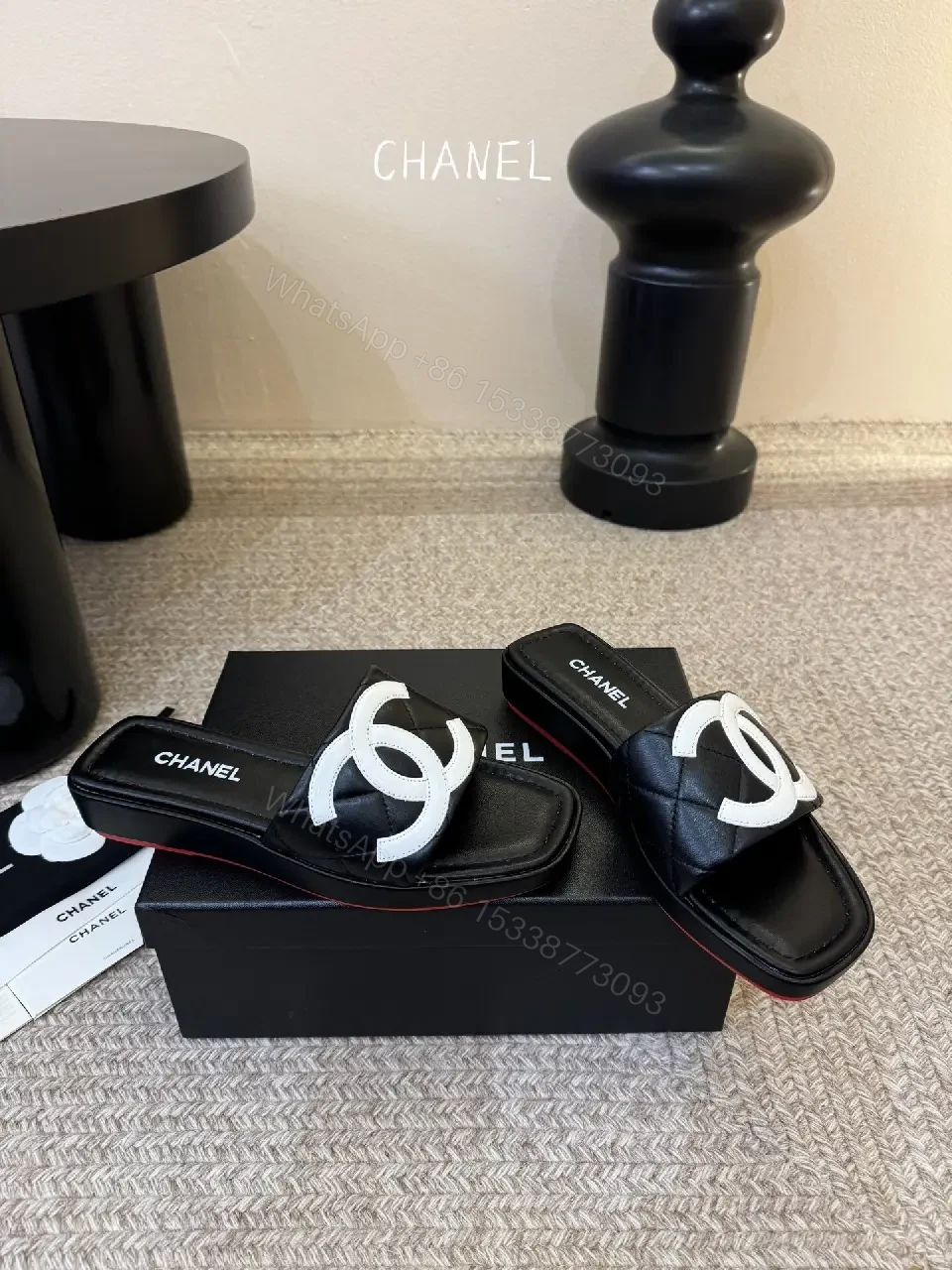 View 9 of Interlocking Logo Slip-Ons: Black & White Luxury Sandals