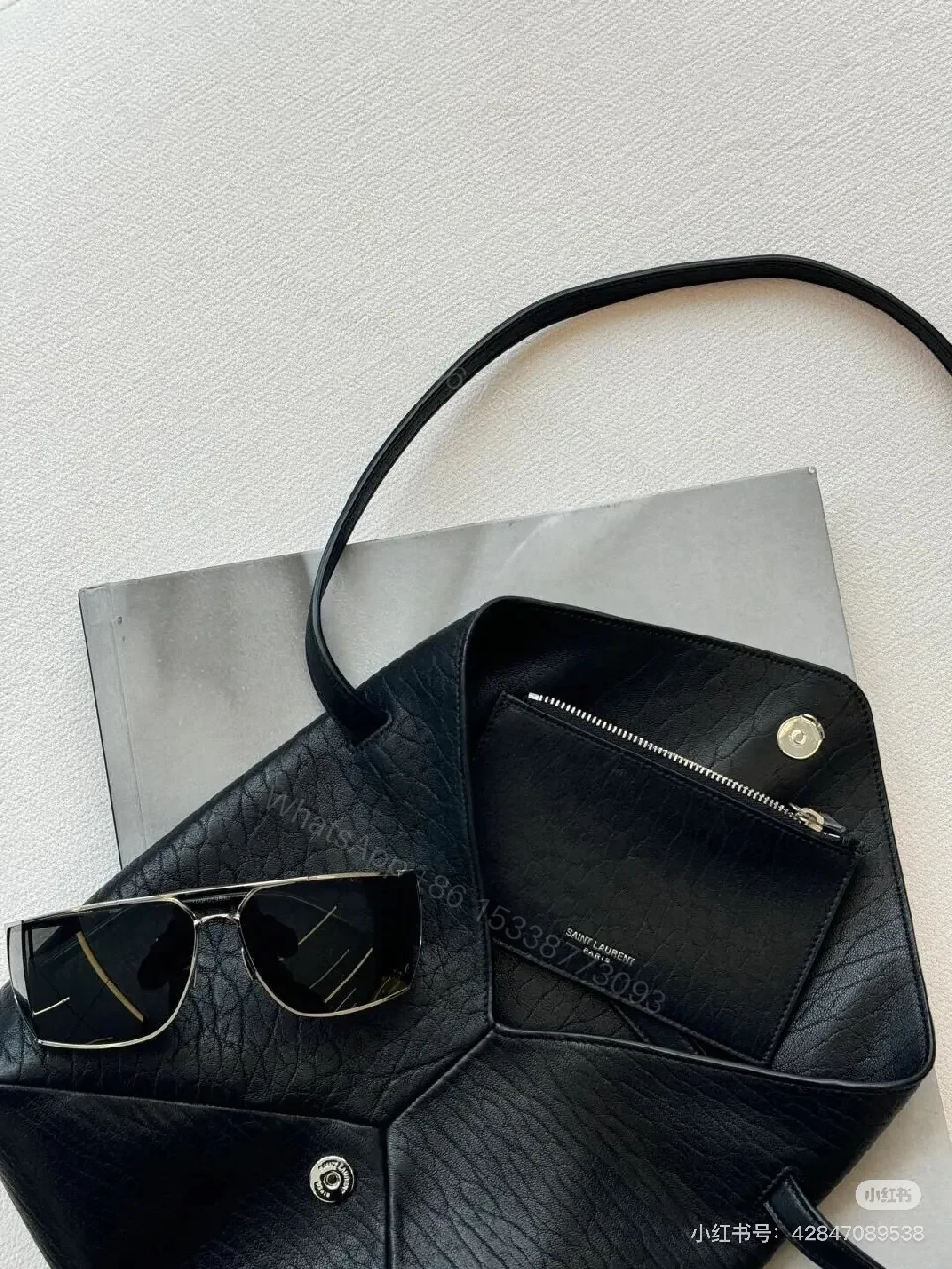 View 3 of Black Textured Leather Envelope Bag – Minimal Logo, Compact & Versatile