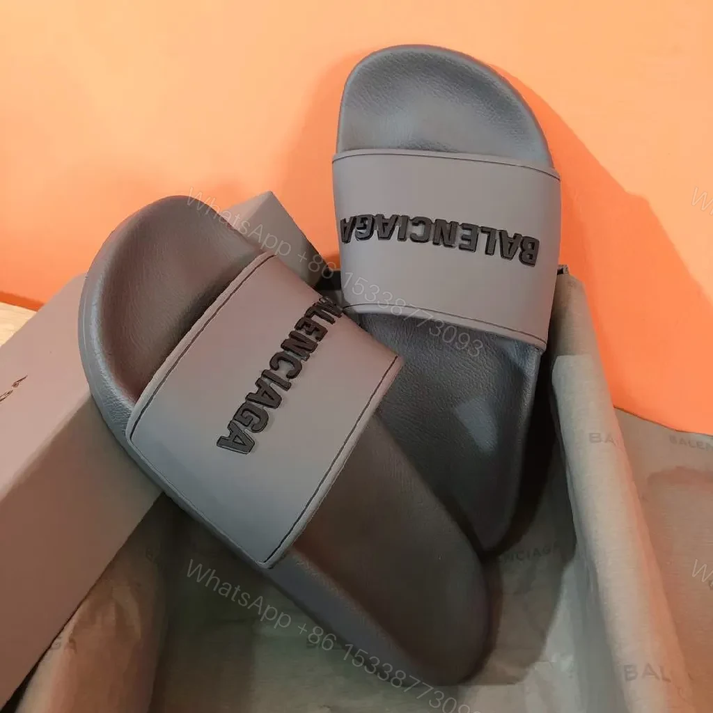 View 8 of Minimalist Designer Slides in Neutral Faux Leather with Bold Logo Strap
