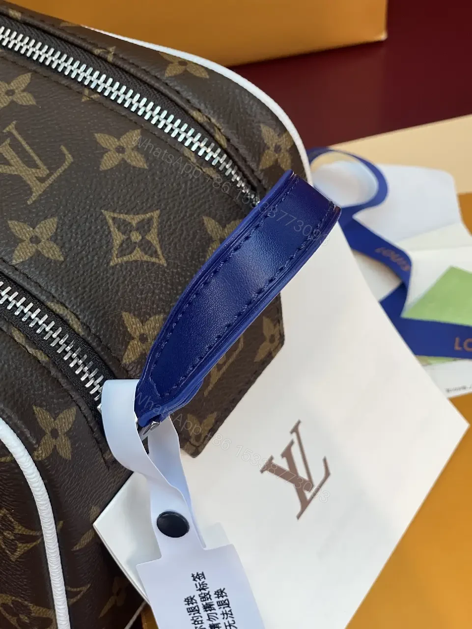 View 5 of Blue Leather Trim Toiletry Bag: Monogram Canvas, LV Zippers, Adjustable Strap