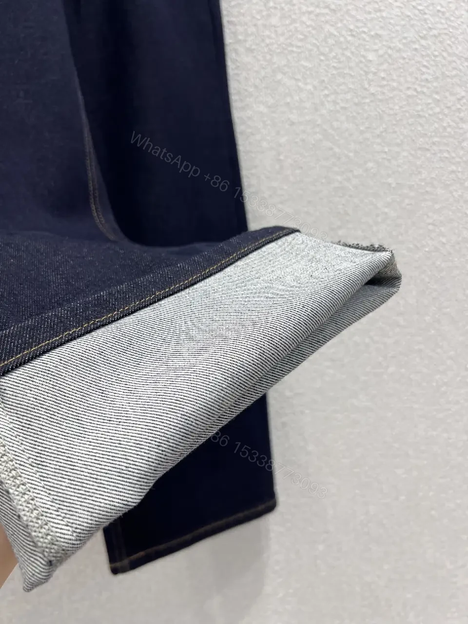 View 5 of Dark Wash Wide-Leg Jeans with Embossed Pockets - Premium Denim