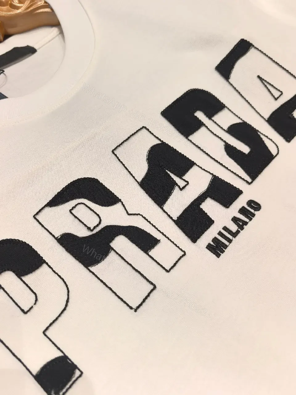 View 6 of White Cotton Crew Tee, Minimalist Luxe, PRADA Milano Logo Tee