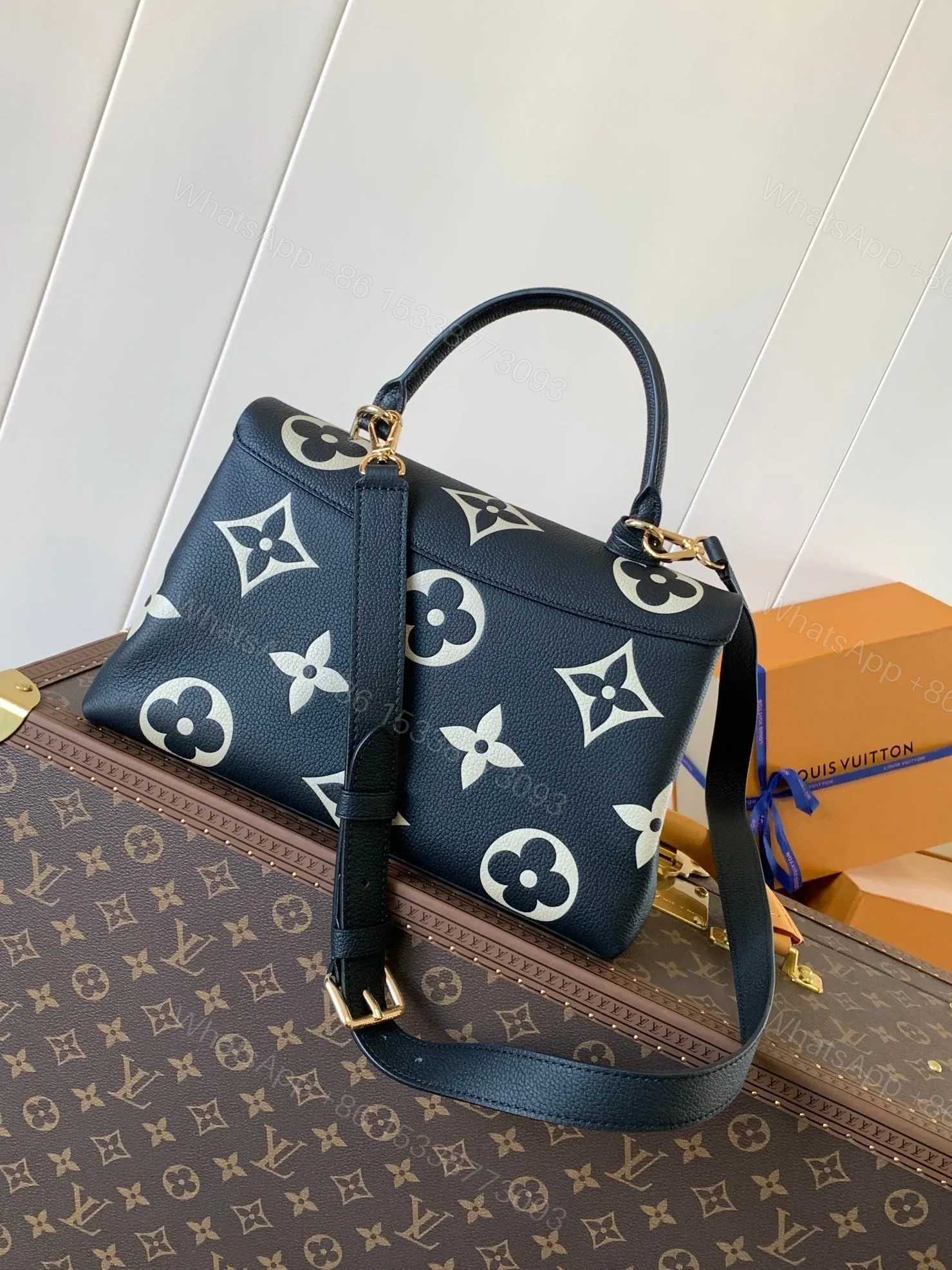 View 3 of LV MADELEINE 30 IN BLACK MIX WHITE MONOGRAM CALFSKIN EMBOSSED LOGO