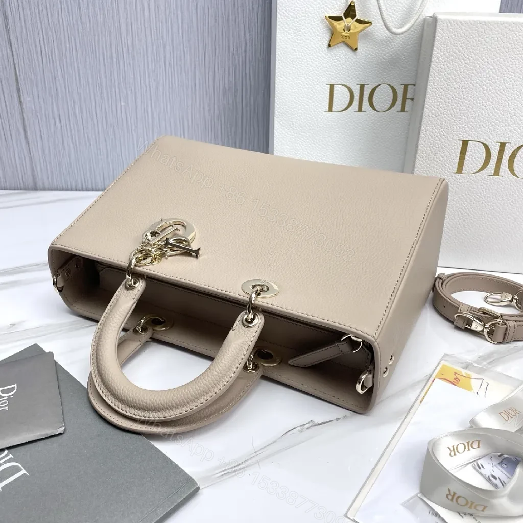 View 7 of Soft-Texture Satchel in Pebbled Leather with Signature Charms