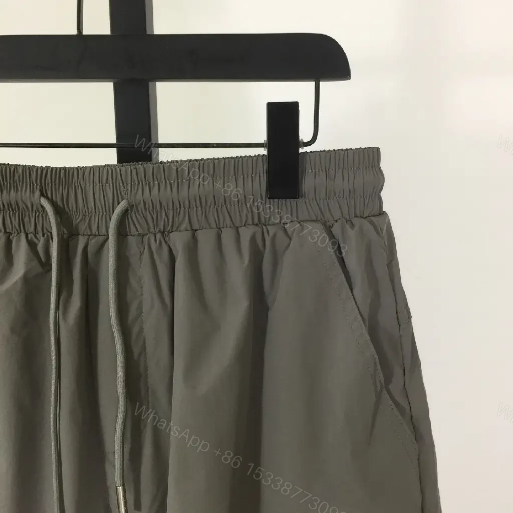 View 8 of Gray Nylon Bermuda Shorts Dior Logo Clip Hem Trim