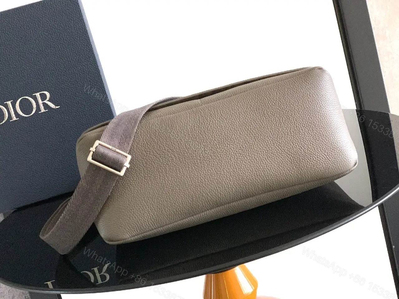 View 6 of Pebble Leather Crossbody: Subtle Branding, Quiet Luxury