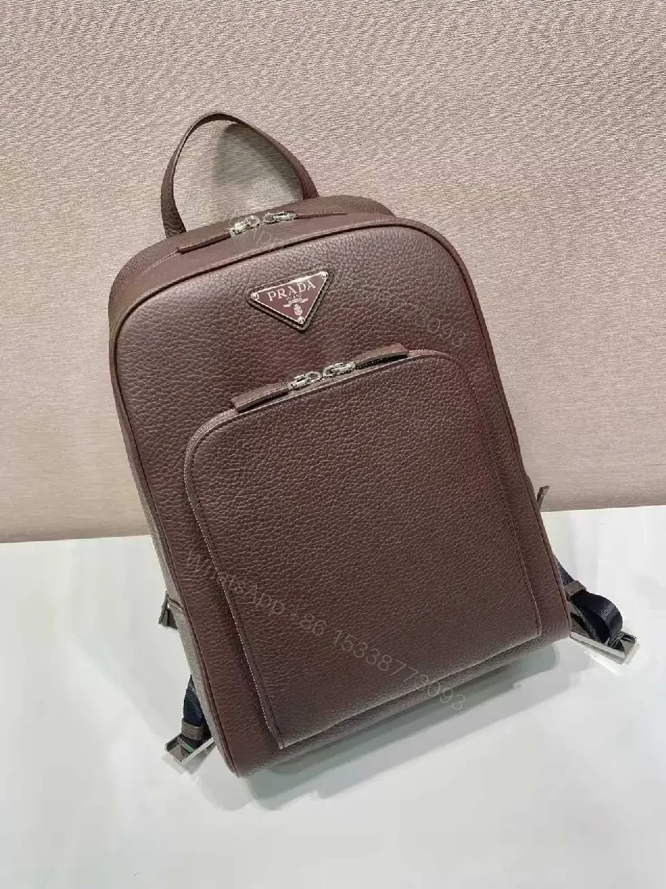 View 8 of Structured Luxury Leather Backpack: Modern Texture, Practical Detailing
