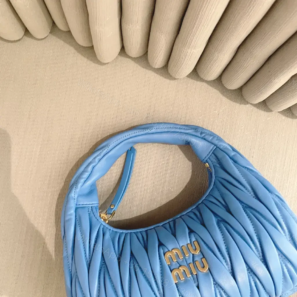 View 8 of Bright Royal Blue Quilted Crescent Handbag with Gold Miu Miu Logo