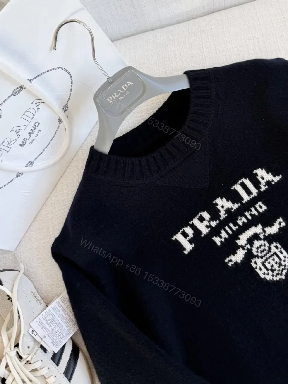 View 4 of Black Knit Logo Crest Luxe Sweater, Relaxed Fit, Premium Knit