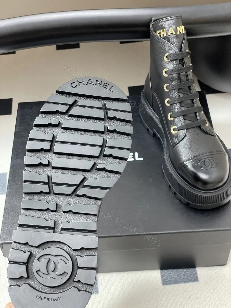 View 2 of Black Leather Combat Boots with Gold Branding Feature