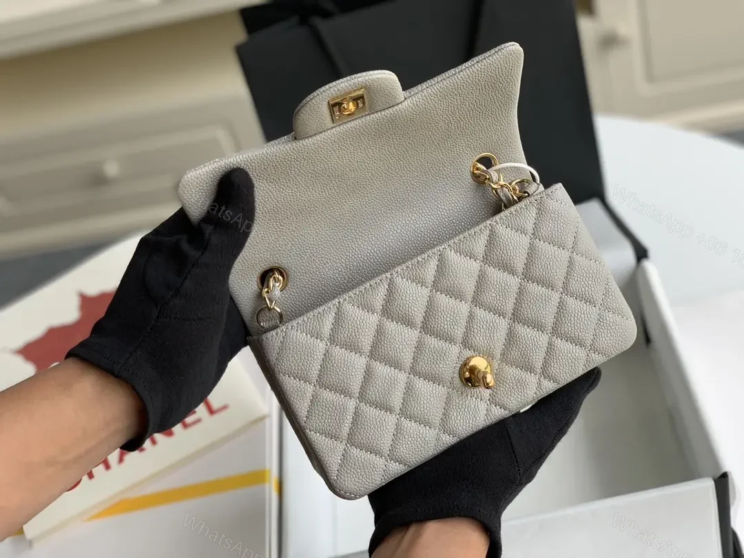 View 6 of Quilted Leather Crossbody: Compact Luxury with Gold Hardware