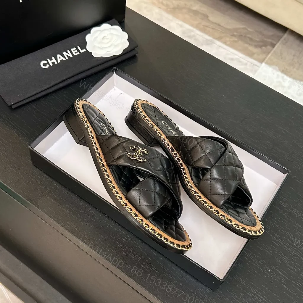 View 7 of Black Quilted Slip-Ons with Chain Trim: Elevated Comfort